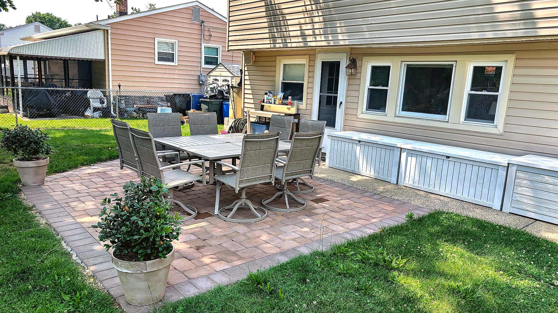 Finished paver patio with outdoor dining set, Turnersville NJ backyard